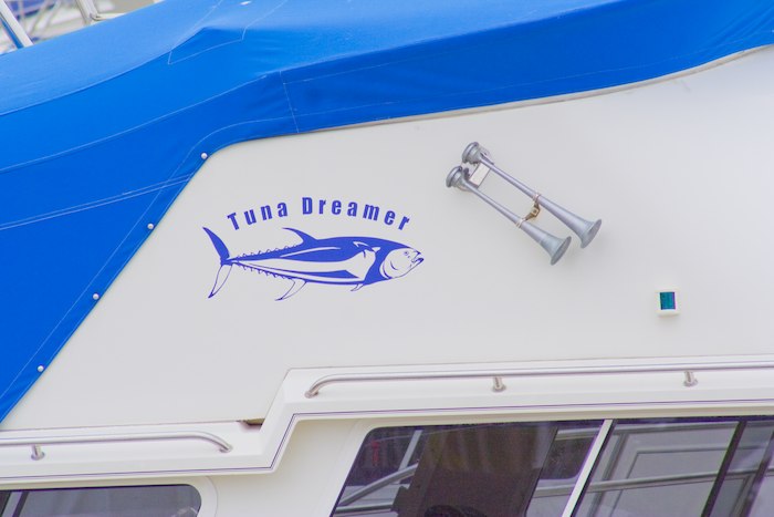 boat named Tuna Dreamer with graphic of a tuna