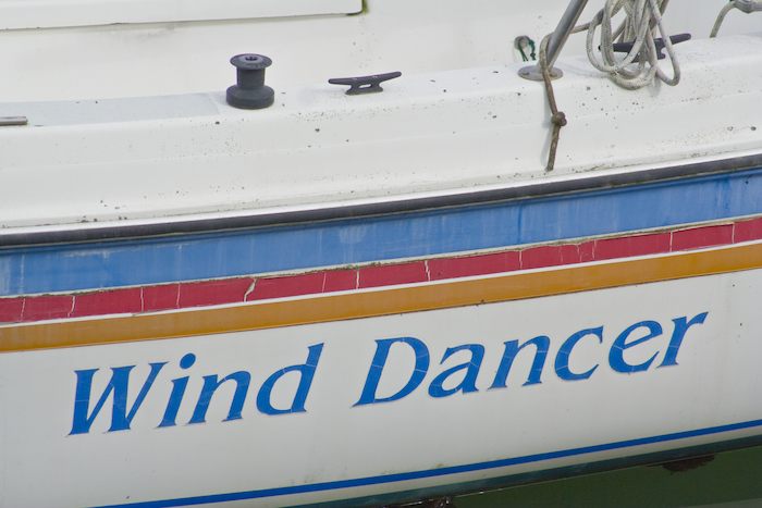 boat named Wind Dancer in a 1970 era look